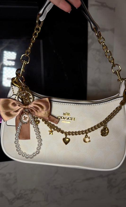 White Accessorized coach